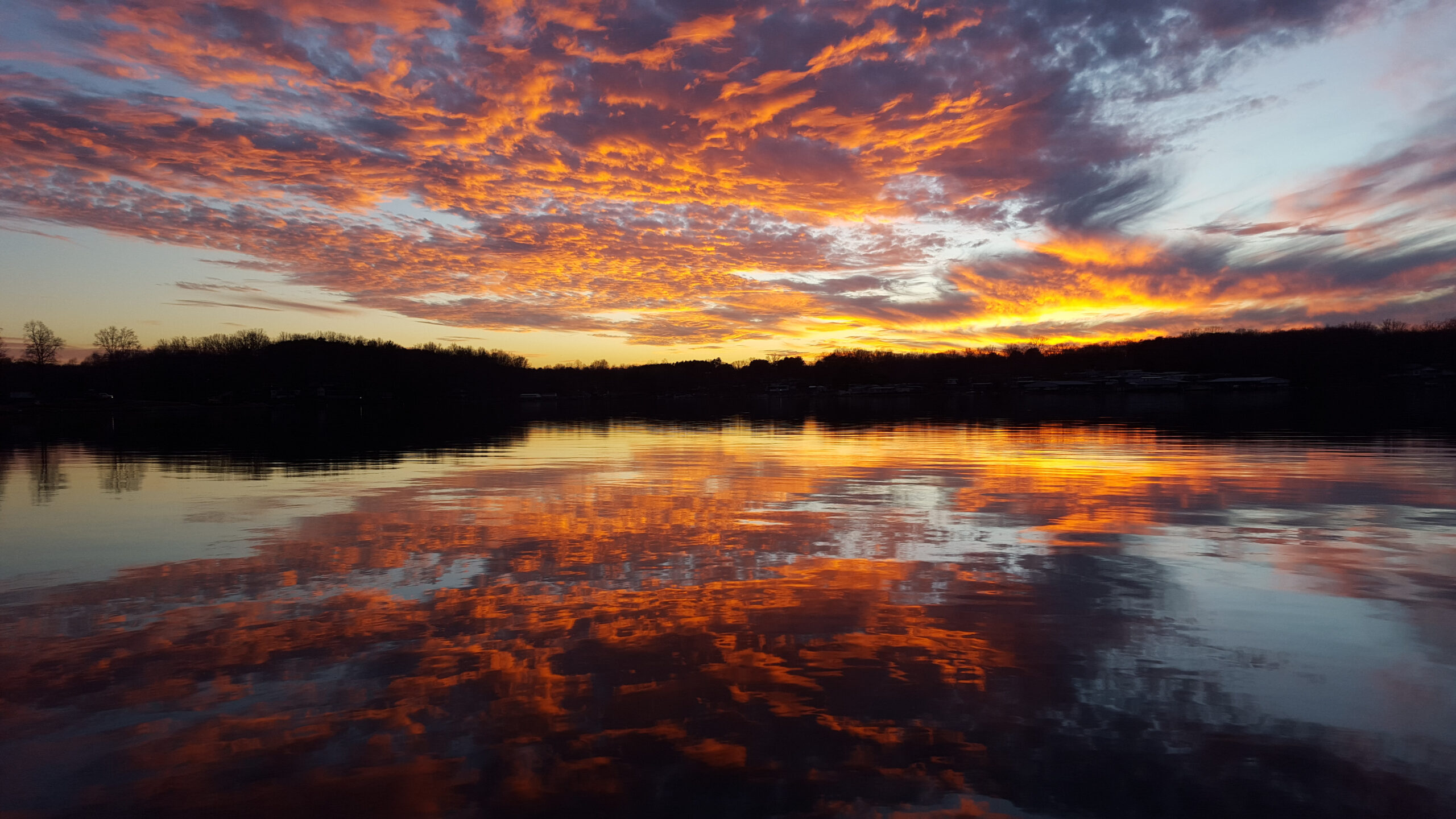 The sun sets over Smith Mountain Lake Virginia